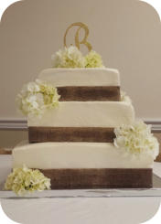Wedding Cake with Burlap and Fresh Flowers 